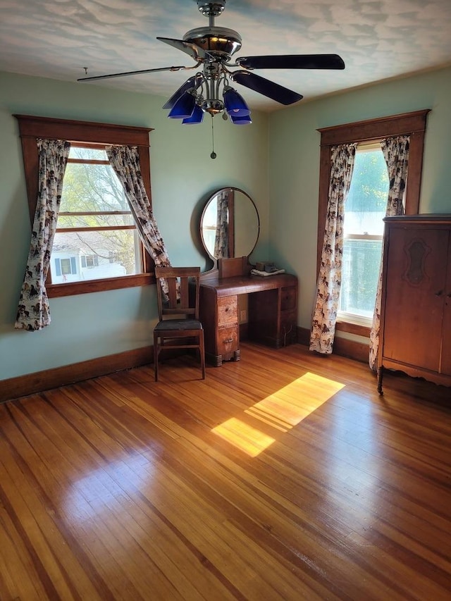 442 High St, Buda, IL 61314 - sitting room with a ceiling fan, wood finished floors, and baseboards