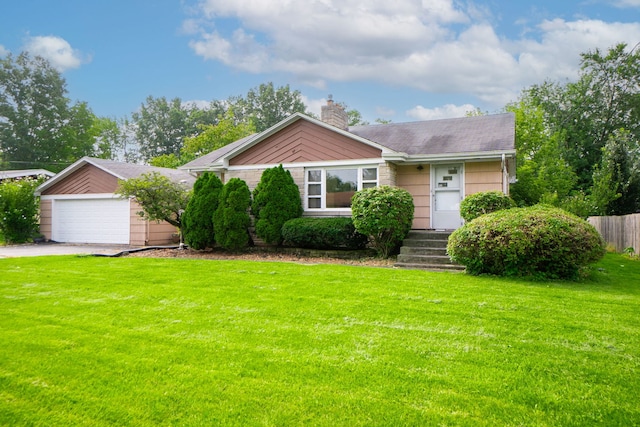 3225 Otto St, Lansing, IL 60438 - view of front of property with a chimney and a detached garage