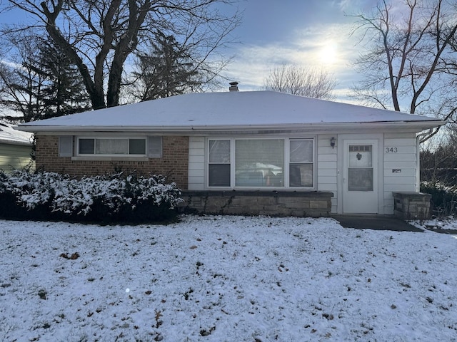 343 Indianwood Blvd, Park Forest, IL 60466 - view of front of home featuring brick siding and a chimney