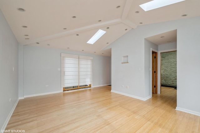 489 Good Ave, Des Plaines, IL 60016 - spare room with a skylight, light wood-style flooring, and baseboards