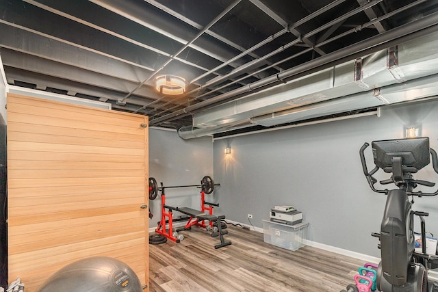 3917 Kristen Ct, Plano, IL 60545 - exercise area with wood finished floors and baseboards