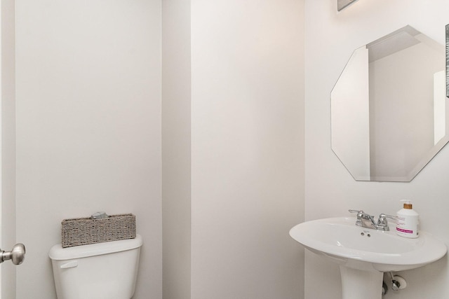 3917 Kristen Ct, Plano, IL 60545 - bathroom with toilet and a sink