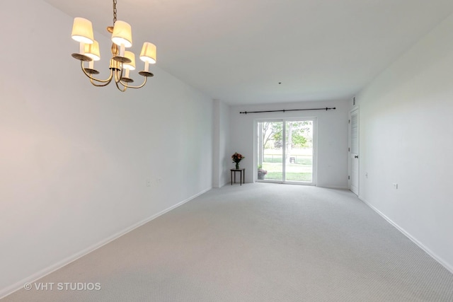 800 Ridge Rd Unit 108, Wilmette, IL 60091 - spare room with a chandelier, light colored carpet, and baseboards