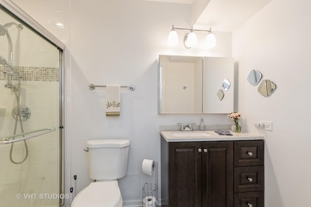 800 Ridge Rd Unit 108, Wilmette, IL 60091 - full bathroom with toilet, vanity, and a stall shower