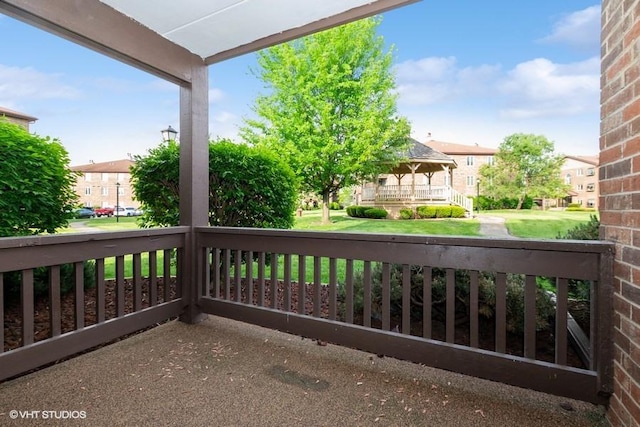 6437 Oak Forest Ave Unit 1E, Tinley Park, IL 60477 - porch featuring a residential view