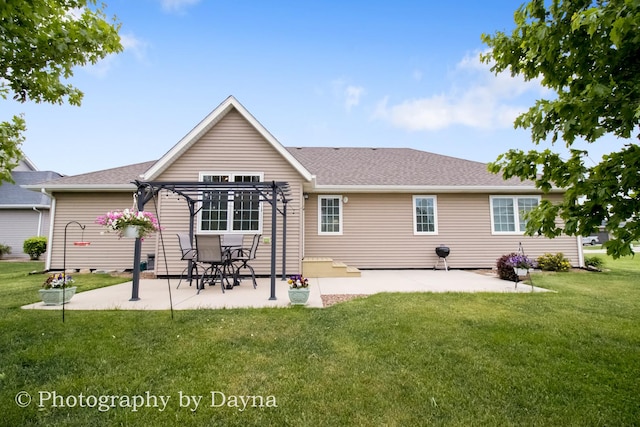 584 Chase Ct, Bourbonnais, IL 60914 - rear view of house featuring a pergola, a patio area, a lawn, and roof with shingles