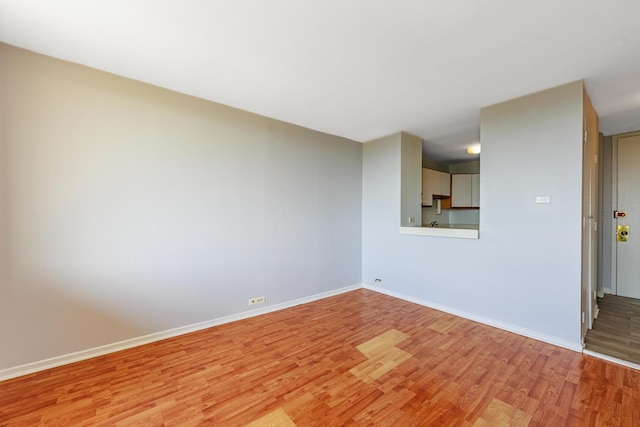 2901 S Michigan Ave Unit 1706, Chicago, IL 60616 - empty room featuring light wood finished floors and baseboards