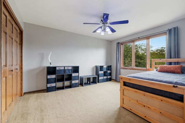 60 Romiga Ln, Palos Park, IL 60464 - bedroom featuring light carpet, a closet, baseboards, and a ceiling fan