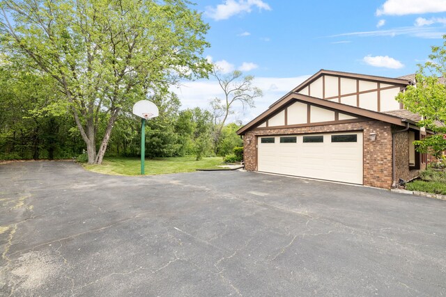 60 Romiga Ln, Palos Park, IL 60464 - garage with asphalt driveway