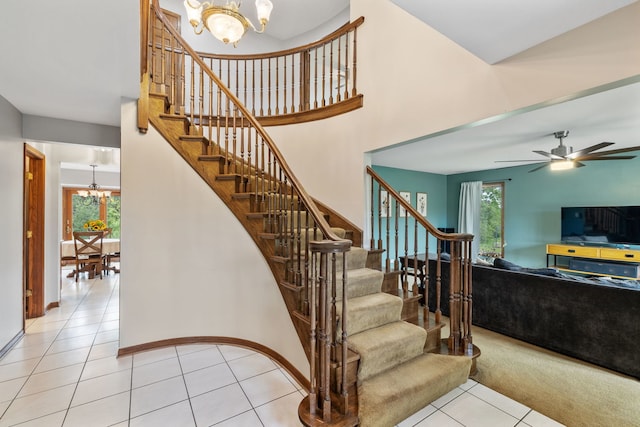 60 Romiga Ln, Palos Park, IL 60464 - staircase with a chandelier, tile patterned flooring, ceiling fan, and baseboards