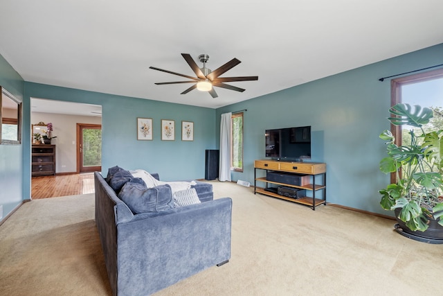 60 Romiga Ln, Palos Park, IL 60464 - carpeted living room featuring a ceiling fan and baseboards