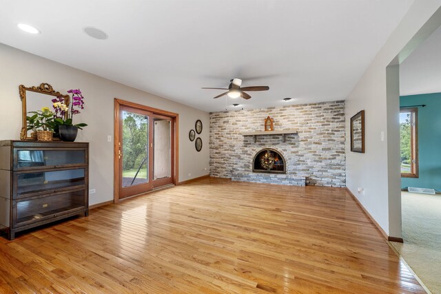 60 Romiga Ln, Palos Park, IL 60464 - unfurnished living room with a ceiling fan, light wood-type flooring, a fireplace, and baseboards