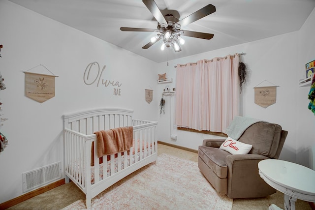 26238 W Hickory Ln, Ingleside, IL 60041 - bedroom with a nursery area, baseboards, ceiling fan, and carpet