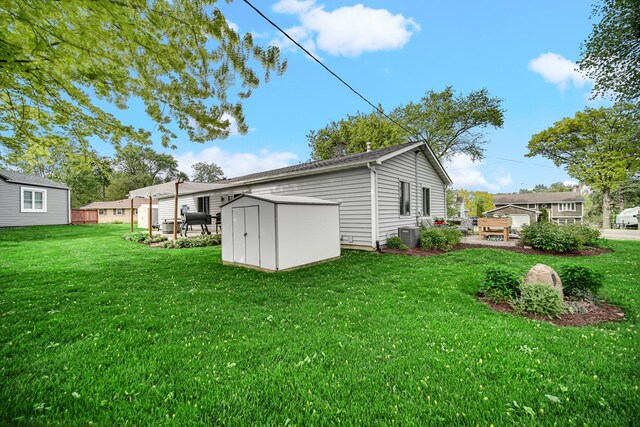 26238 W Hickory Ln, Ingleside, IL 60041 - rear view of property with a lawn and central AC