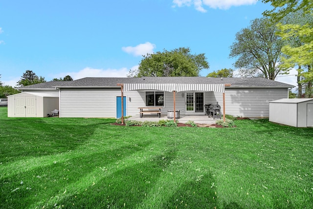 26238 W Hickory Ln, Ingleside, IL 60041 - rear view of house featuring a patio area and a lawn