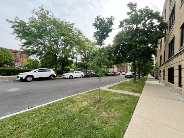 3604 W Dickens Ave Unit G, Chicago, IL 60647 - view of asphalt road featuring sidewalks and curbs