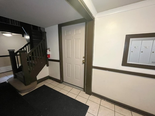 3604 W Dickens Ave Unit G, Chicago, IL 60647 - entryway featuring light tile patterned floors, stairway, and mail area