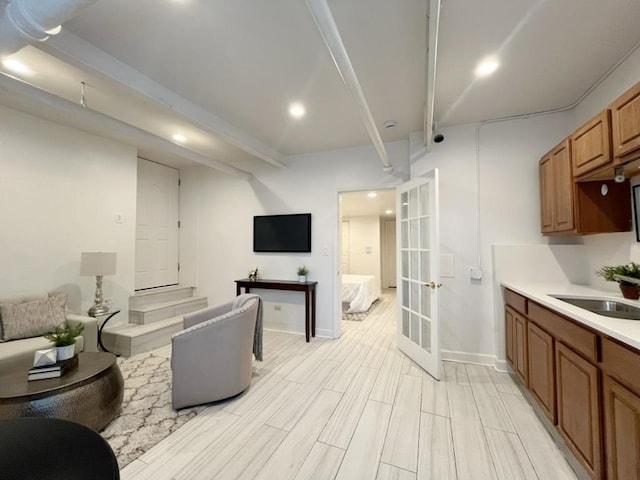 3604 W Dickens Ave Unit G, Chicago, IL 60647 - kitchen featuring open floor plan, french doors, light countertops, recessed lighting, and beamed ceiling