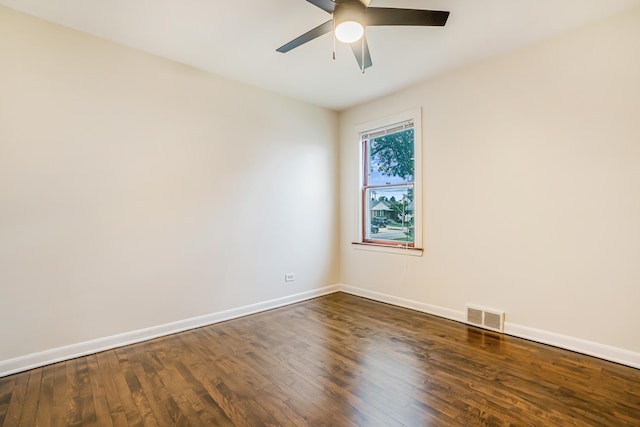 3113 N Osceola Ave, Chicago, IL 60707 - empty room featuring dark wood-style floors, baseboards, and ceiling fan