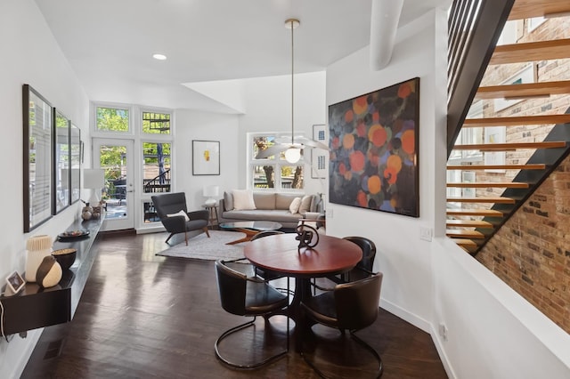 832 W Wolfram St, Chicago, IL 60657 - dining room with dark wood-type flooring, baseboards, and stairs