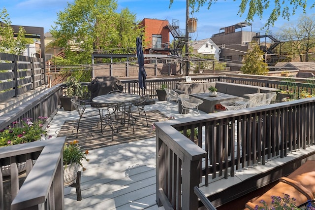 832 W Wolfram St, Chicago, IL 60657 - wooden deck with a fenced backyard and outdoor dining area