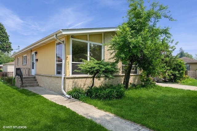 9011 Menard Ave, Morton Grove, IL 60053 - view of side of property featuring brick siding