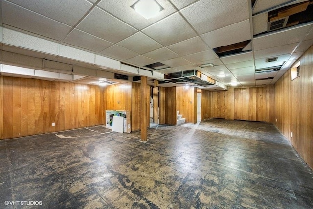 9011 Menard Ave, Morton Grove, IL 60053 - finished basement featuring a drop ceiling, wood walls, stairs, and tile patterned floors