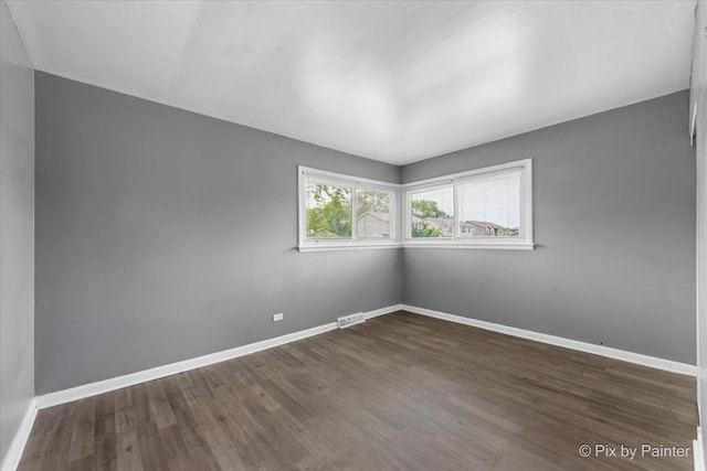 2756 Lancaster Dr, Markham, IL 60428 - empty room with wood finished floors and baseboards
