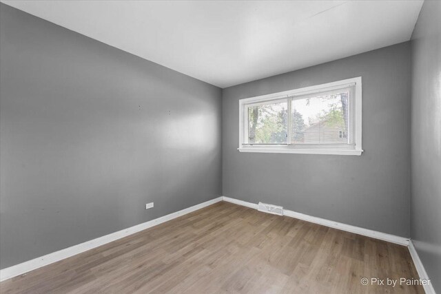 2756 Lancaster Dr, Markham, IL 60428 - empty room featuring wood finished floors and baseboards