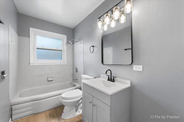 2756 Lancaster Dr, Markham, IL 60428 - bathroom with wood finished floors, vanity, toilet, and shower / tub combination