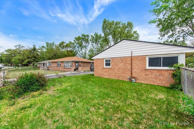 2756 Lancaster Dr, Markham, IL 60428 - rear view of house featuring brick siding