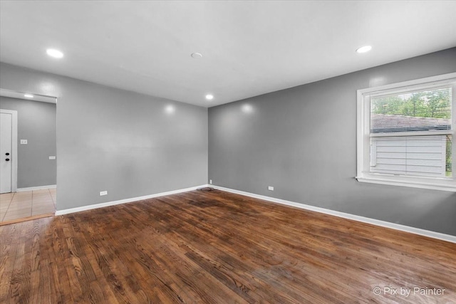2756 Lancaster Dr, Markham, IL 60428 - spare room featuring wood finished floors, baseboards, and recessed lighting