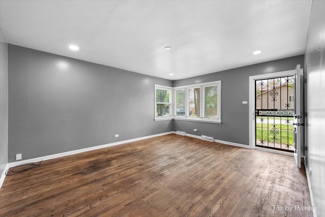 2756 Lancaster Dr, Markham, IL 60428 - unfurnished room featuring wood finished floors, baseboards, and recessed lighting