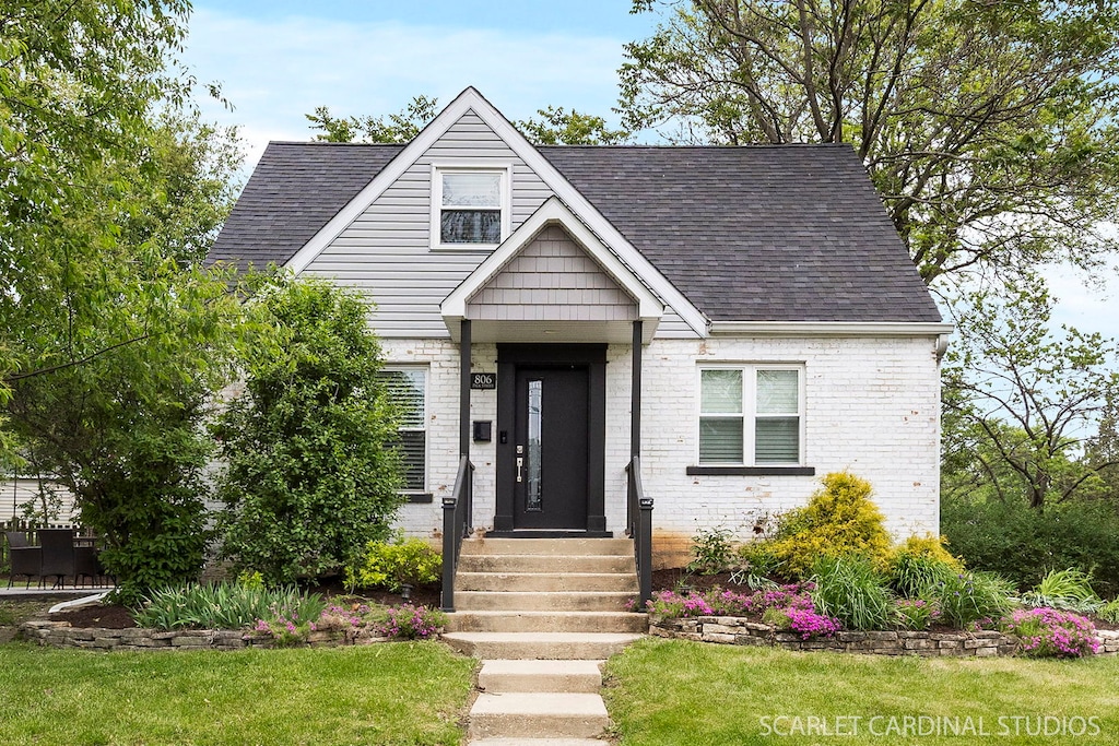 806 Pick St, Wheaton, IL 60187 - view of front of house featuring brick siding and a shingled roof