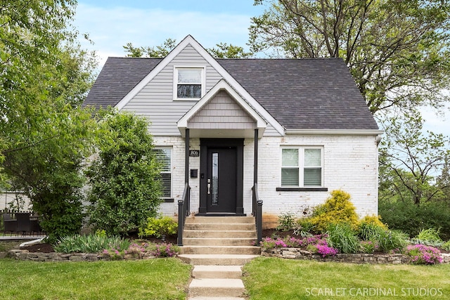 806 Pick St, Wheaton, IL 60187 - view of front of house featuring brick siding and a shingled roof