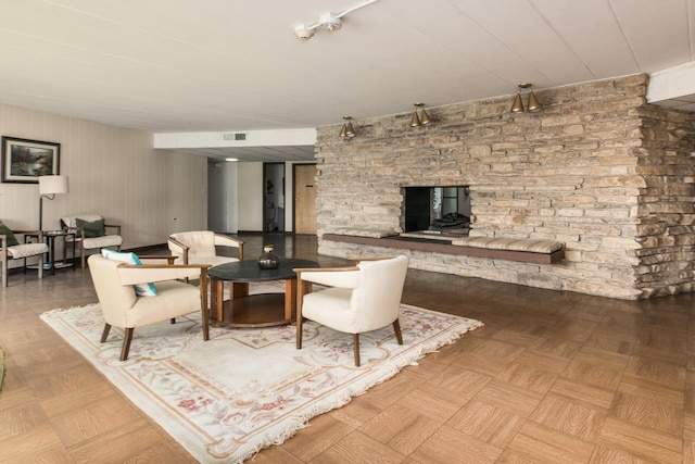 5540 Walnut Ave Unit 23C, Downers Grove, IL 60515 - living room featuring a stone fireplace