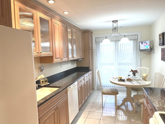 8001 W Courte Dr Unit 307, Niles, IL 60714 - kitchen with white appliances, light tile patterned flooring, glass insert cabinets, dark stone counters, and recessed lighting