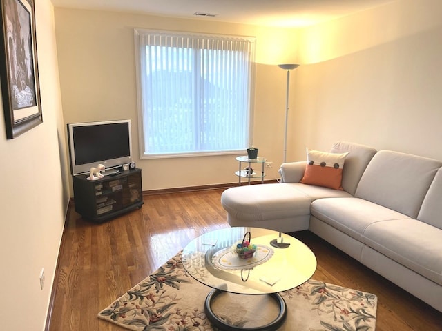 8001 W Courte Dr Unit 307, Niles, IL 60714 - living area featuring wood finished floors and baseboards