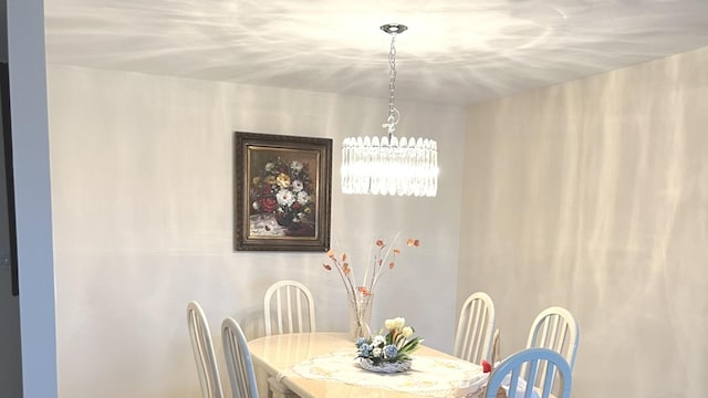8001 W Courte Dr Unit 307, Niles, IL 60714 - dining area with a chandelier