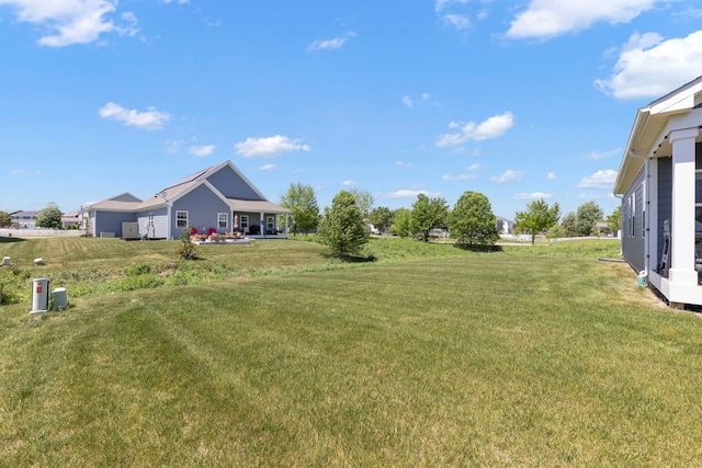 319 Carole St, Sugar Grove, IL 60554 - view of green lawn featuring a garage