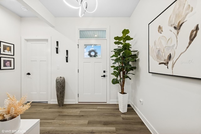 319 Carole St, Sugar Grove, IL 60554 - entrance foyer featuring wood finished floors, baseboards, and a chandelier