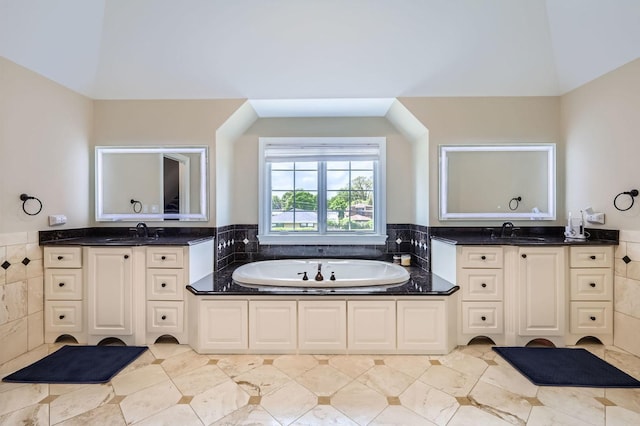 349 Home Ave, Itasca, IL 60143 - bathroom featuring tile walls, a wainscoted wall, a bath, tile patterned flooring, and two vanities