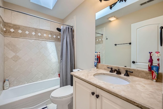 349 Home Ave, Itasca, IL 60143 - bathroom with toilet, shower / bathtub combination with curtain, a skylight, and vanity