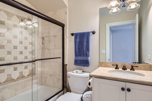 349 Home Ave, Itasca, IL 60143 - bathroom featuring vanity, bath / shower combo with glass door, and toilet