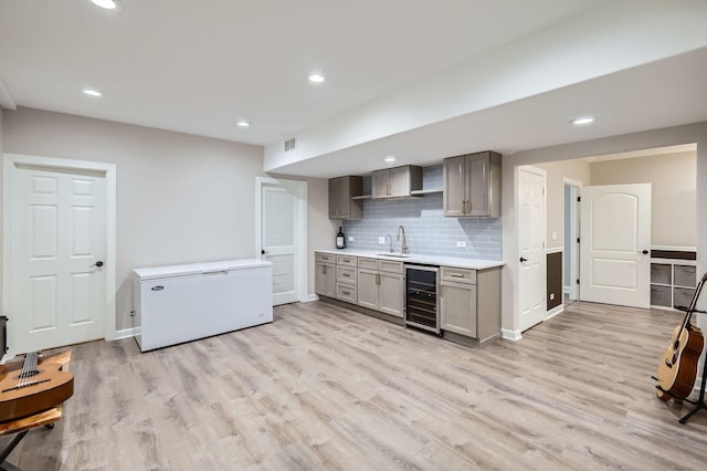 349 Home Ave, Itasca, IL 60143 - kitchen featuring beverage cooler, a sink, fridge, gray cabinets, and light countertops