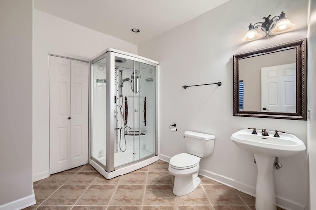 349 Home Ave, Itasca, IL 60143 - full bath featuring baseboards, a stall shower, toilet, and a closet