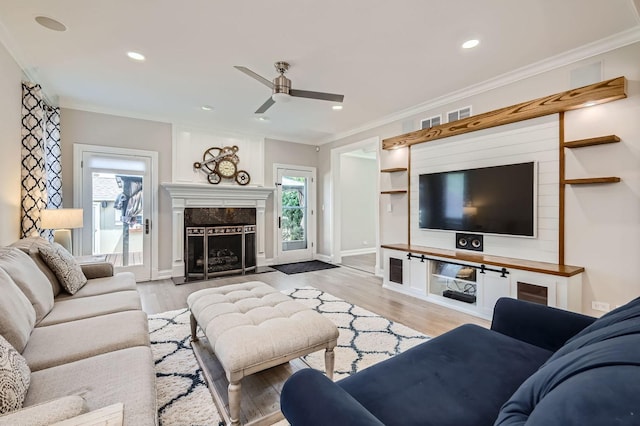 349 Home Ave, Itasca, IL 60143 - living area with crown molding, ceiling fan, a fireplace, recessed lighting, and wood finished floors