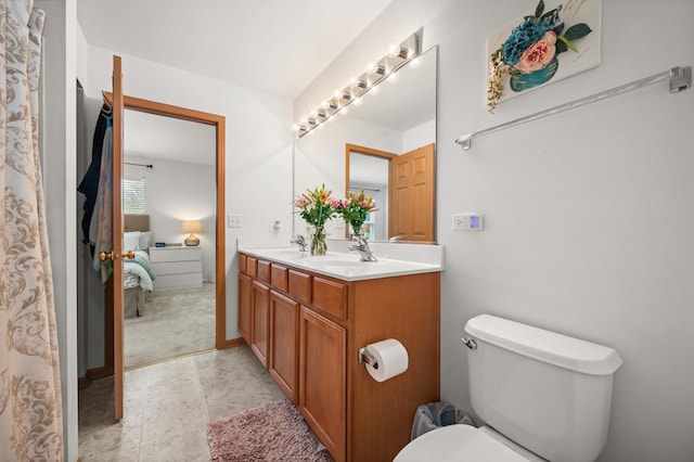 1481 Cambria Dr Unit 1, Dekalb, IL 60115 - bathroom featuring ensuite bathroom, toilet, and double vanity