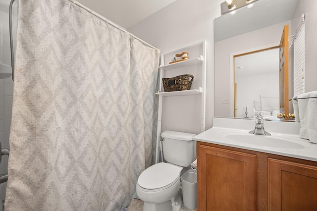 1481 Cambria Dr Unit 1, Dekalb, IL 60115 - full bathroom featuring vanity, toilet, and a shower with curtain