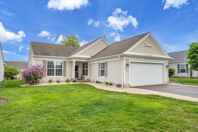 13569 Winterberry Ln, Huntley, IL 60142 - ranch-style house with a garage, driveway, and a front lawn